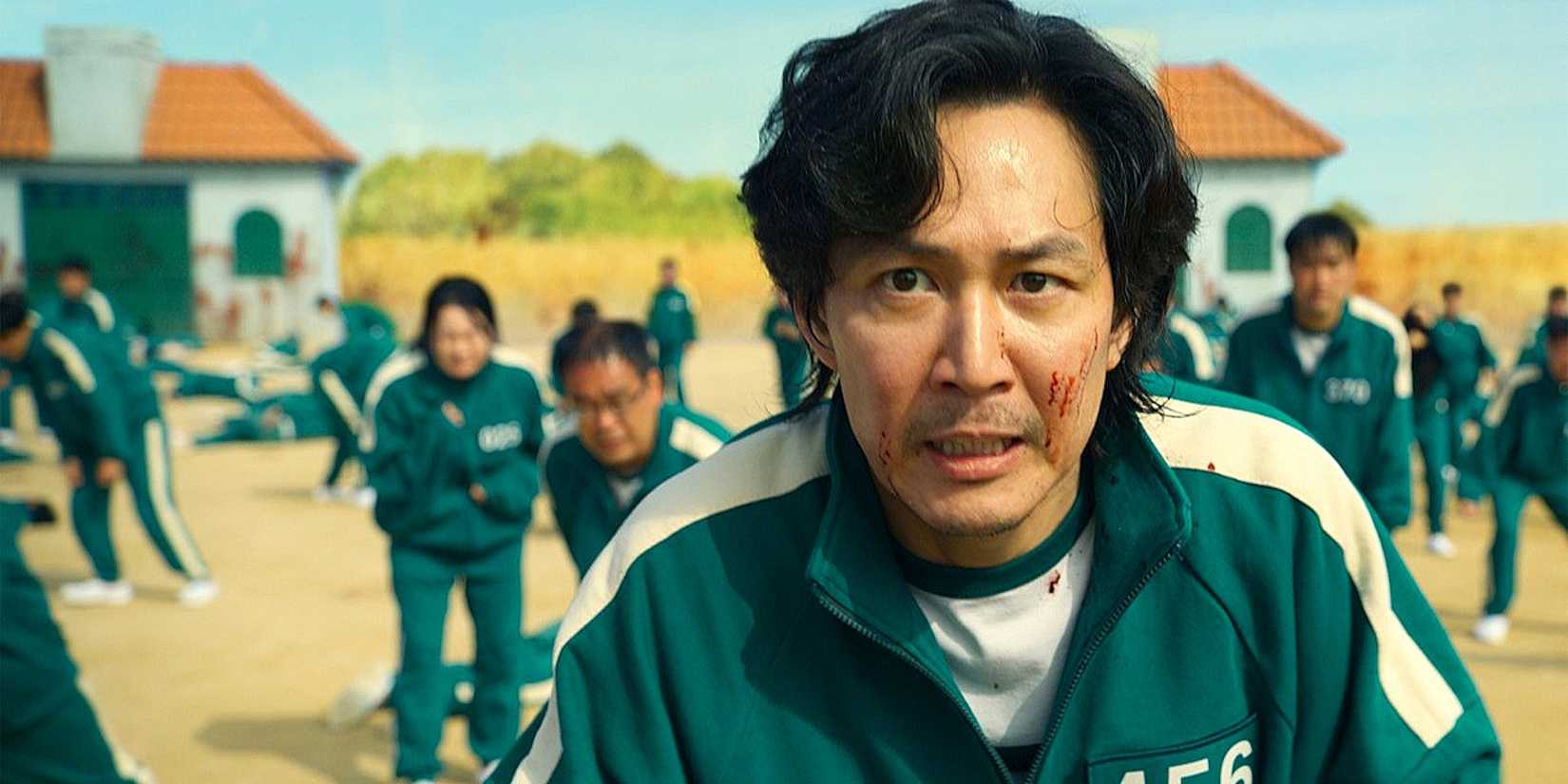 Gi-hun looking angry and determined Playing Red Light Green Light In Squid Game