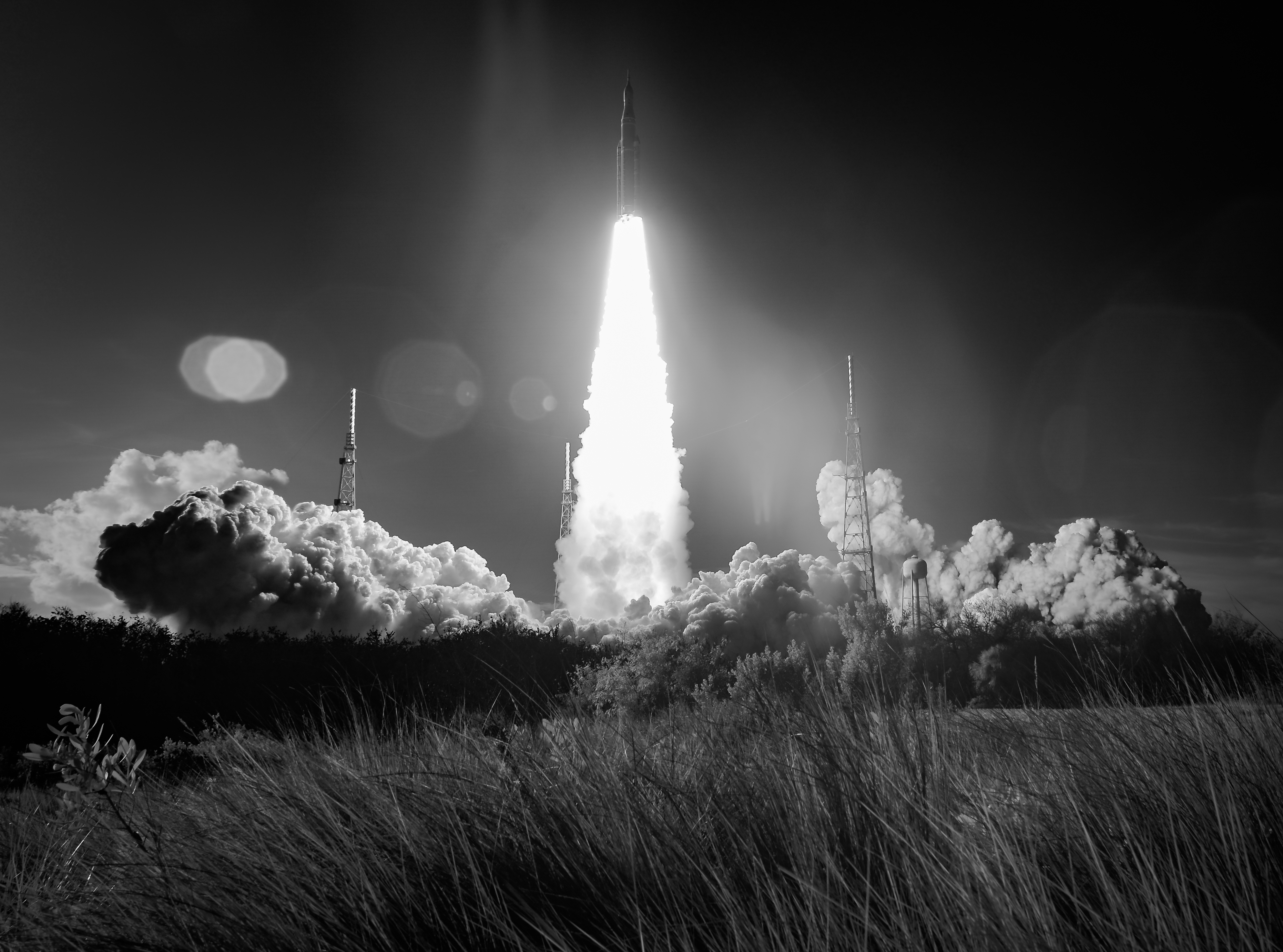 In this black and white infrared image, NASA’s Space Launch System rocket carrying the Orion spacecraft  launches on the Artemis II mission, Wednesday, April 1, 2026
