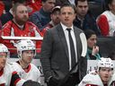 Ottawa Senators head coach Travis Green watches the action from the bench during the first period of an NHL hockey game against the Washington Capitals, Wednesday, March 18, 2026, in Washington.
