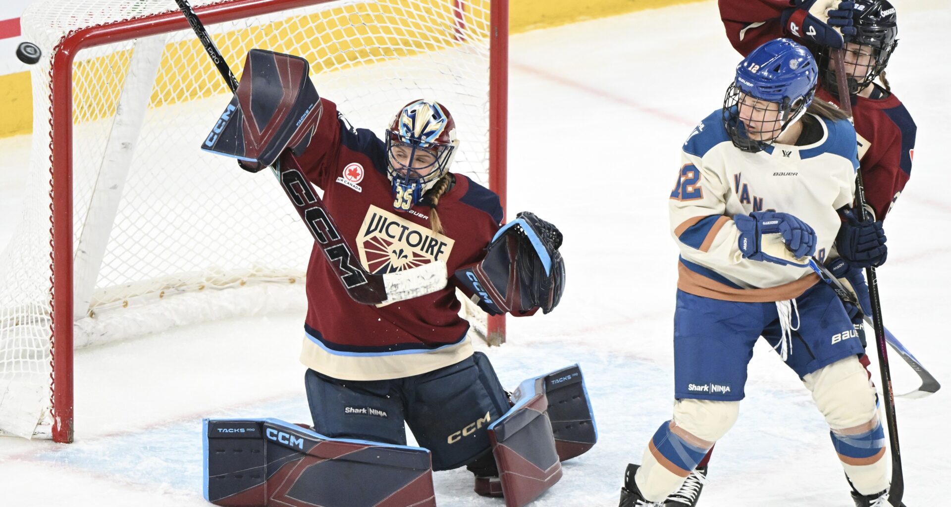 Montreal Victoire goaltender Ann-Renée Desbiens (35) deflects the puck away from her net