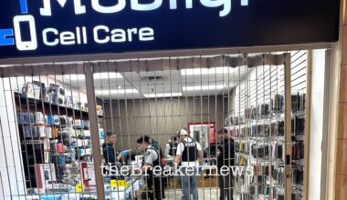Police search Vancouver cell phone repair store