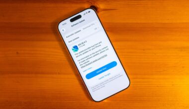 A phone showing the iOS 26.4.2 update to be installed.