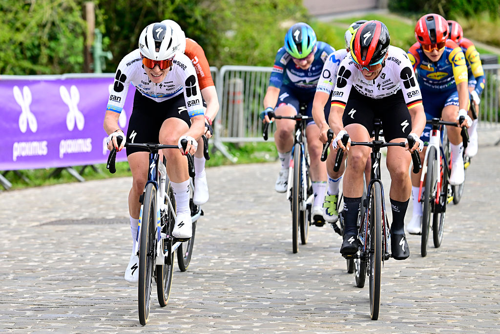 Vollering (L) and Koch (R) lead a small group over the cobbles