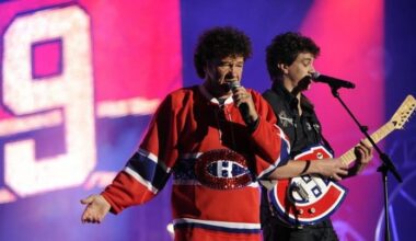 Quebec singer Robert Charlebois wearing a Canadiens jersey and his son Jérôme Charlebois perform at the Fête Nationale concert at Parc Maisonneuve in Montreal on June 24, 2012.