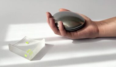 aluminum and acrylic objects frame touch, weight, and movement as design tools