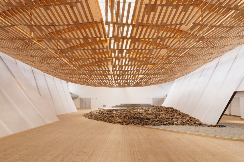 Hall with wooden floor and ceiling