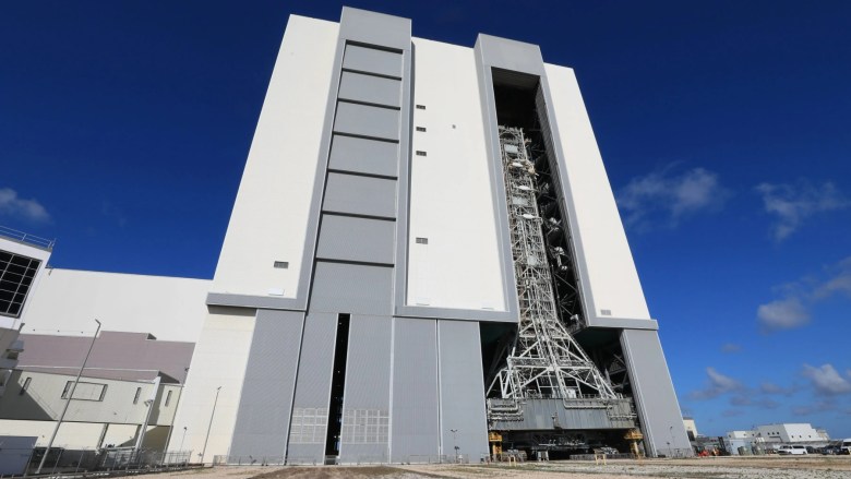 NASA’s mobile launcher enters the Vehicle Assembly Building following its approximately 4-mile trek from Launch Complex 39B at the agency’s Kennedy Space Center in Florida on Friday, April 17, 2026, in preparation for Artemis III stacking operations. Teams will perform checkouts, inspections, and data analysis, and make repairs to the tower that saw damage during launch of NASA’s Artemis II test flight on April 1, 2026.  Credit: NASA/Kim Shiflett