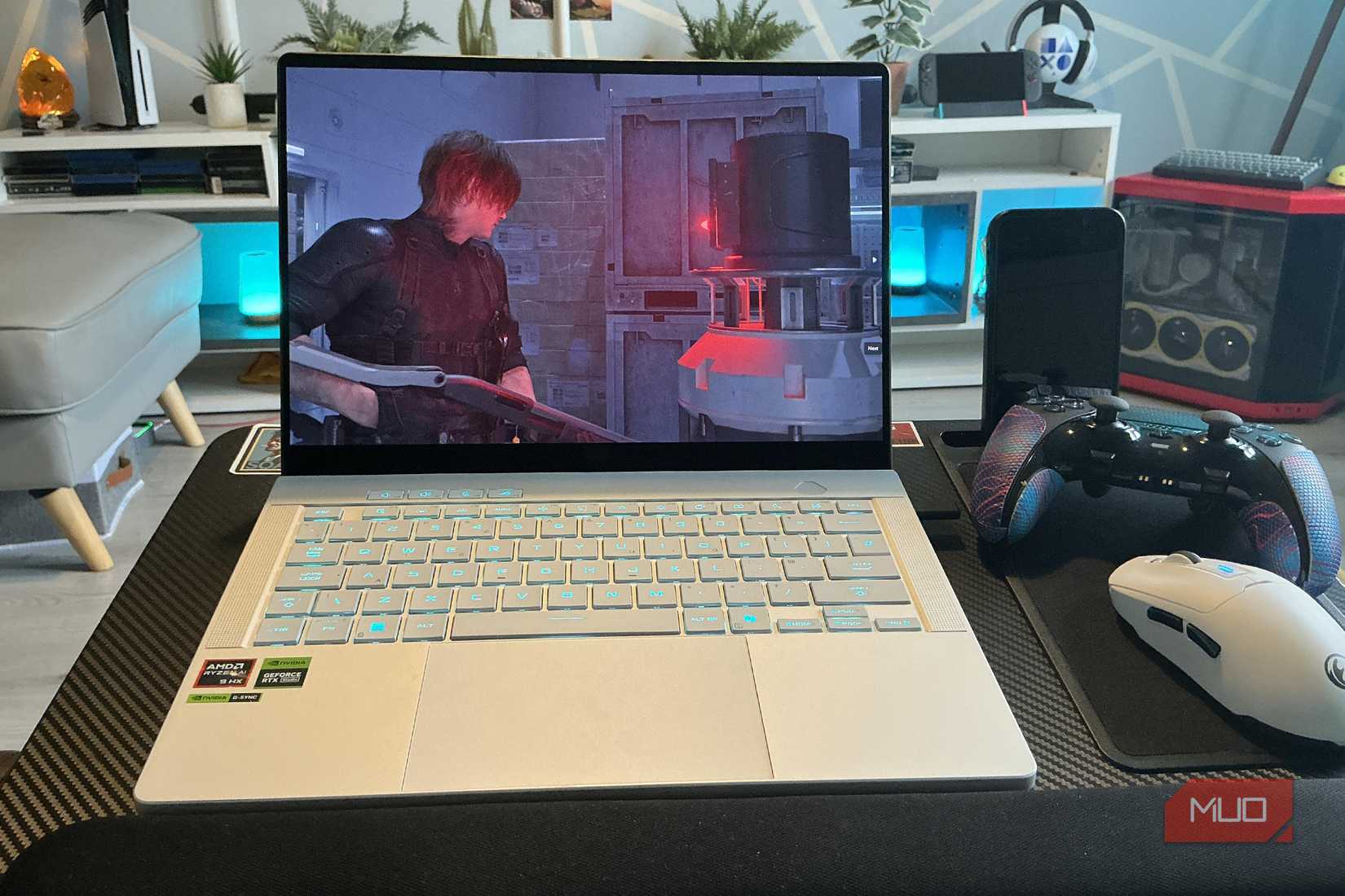 LapGear Pro Home Office lap desk with silver gaming laptop