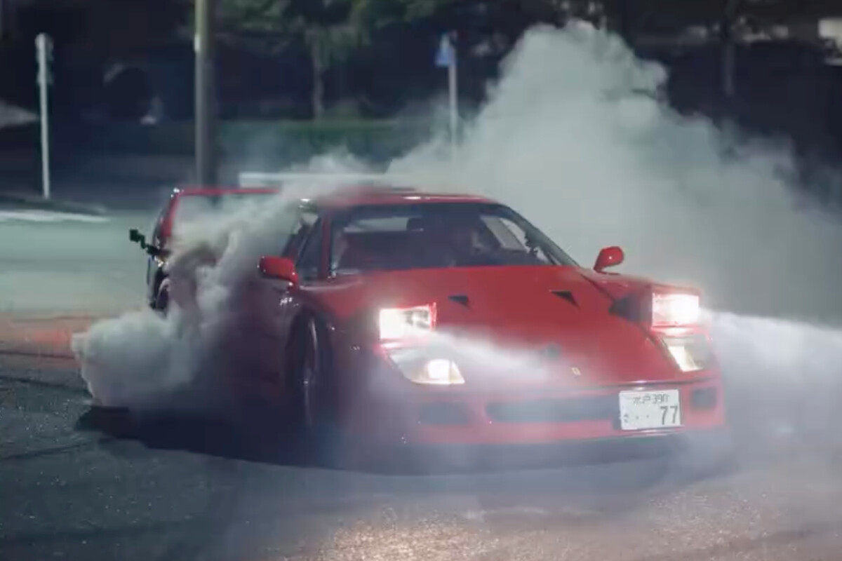 Lewis Hamilton drifts a Ferrari around Tokyo with Kim Kardashian
