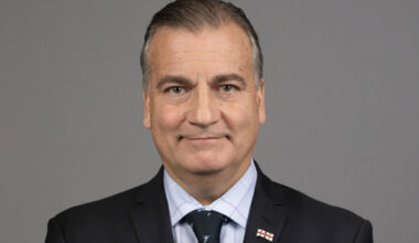 Mauro Barone wears a suit in a closeup professional headshot.