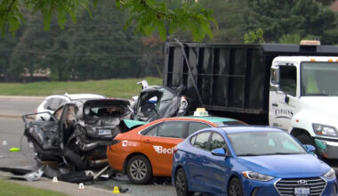 A MiWay bus at a busy intersection in Mississauga, highlighting the area of the crash.