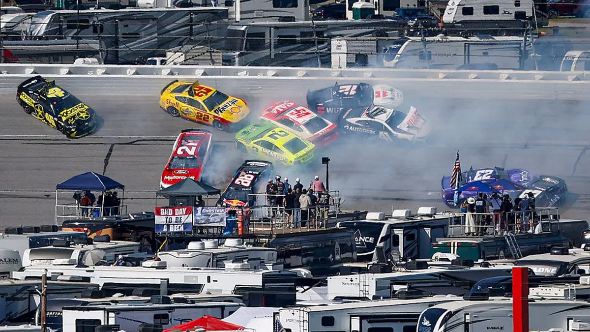 Tyler Reddick, Joey Logano, Josh Berry, Austin Cindric, Connor Zilisch, and Bubba Wallace spin on track during NASCAR race