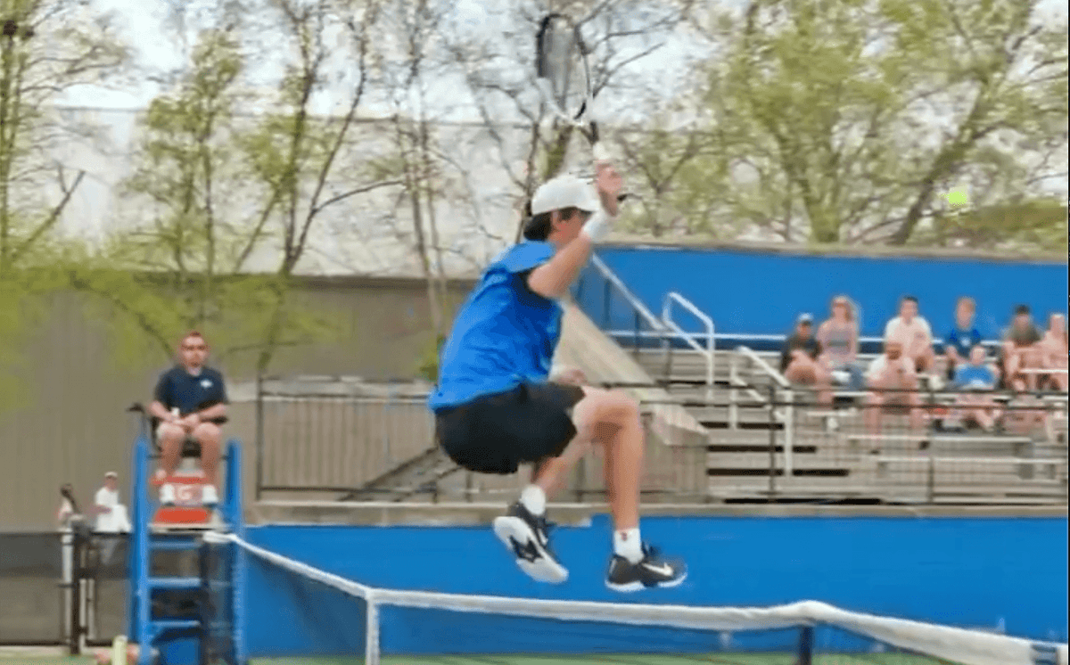 A college tennis player’s leaping shot across the net went viral. There was just one problem