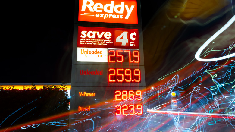 A petrol station sign shows pricing in Sydney, Australia on March 30, 2026.
