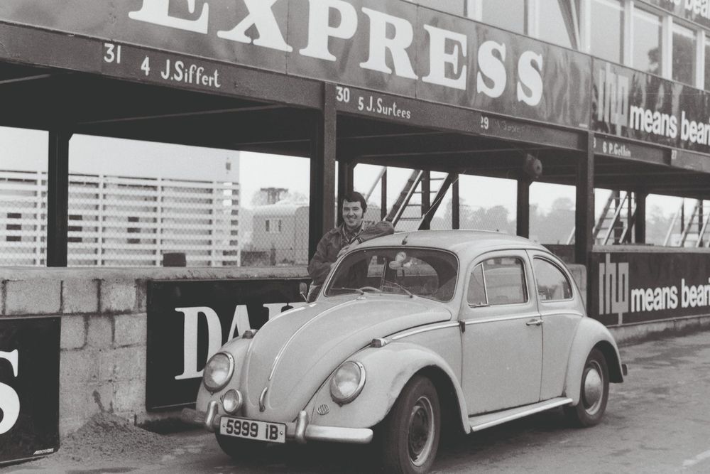 Hamilton strikes a pose 
with his venerable vee-dub. Note the supplementary bumper-mounted lighting