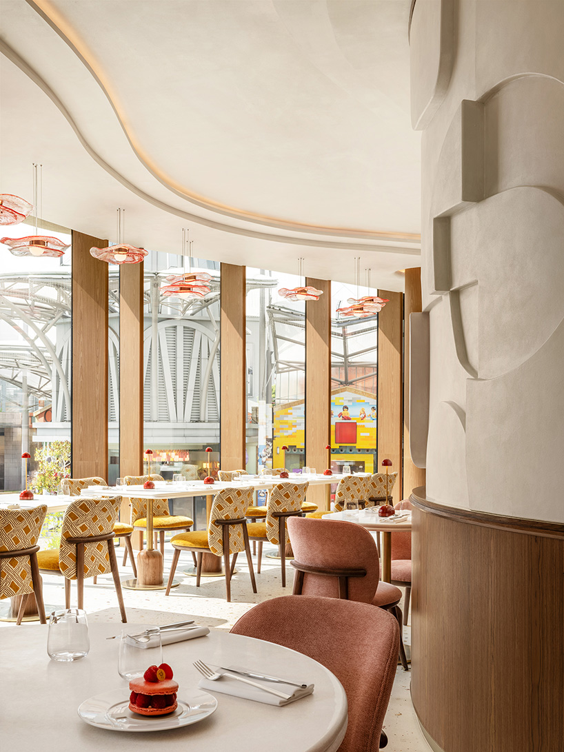 curved wood, rattan, and macaron displays frame a tropical french pâtisserie in singapore - 12