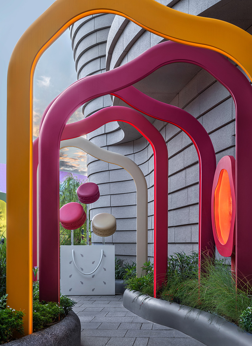 curved wood, rattan, and macaron displays frame a tropical french pâtisserie in singapore - 2