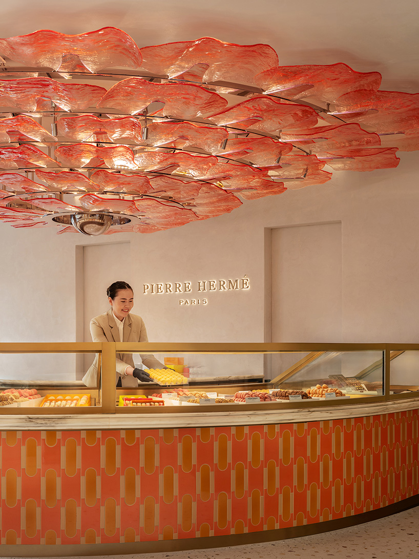 curved wood, rattan, and macaron displays frame a tropical french pâtisserie in singapore - 4