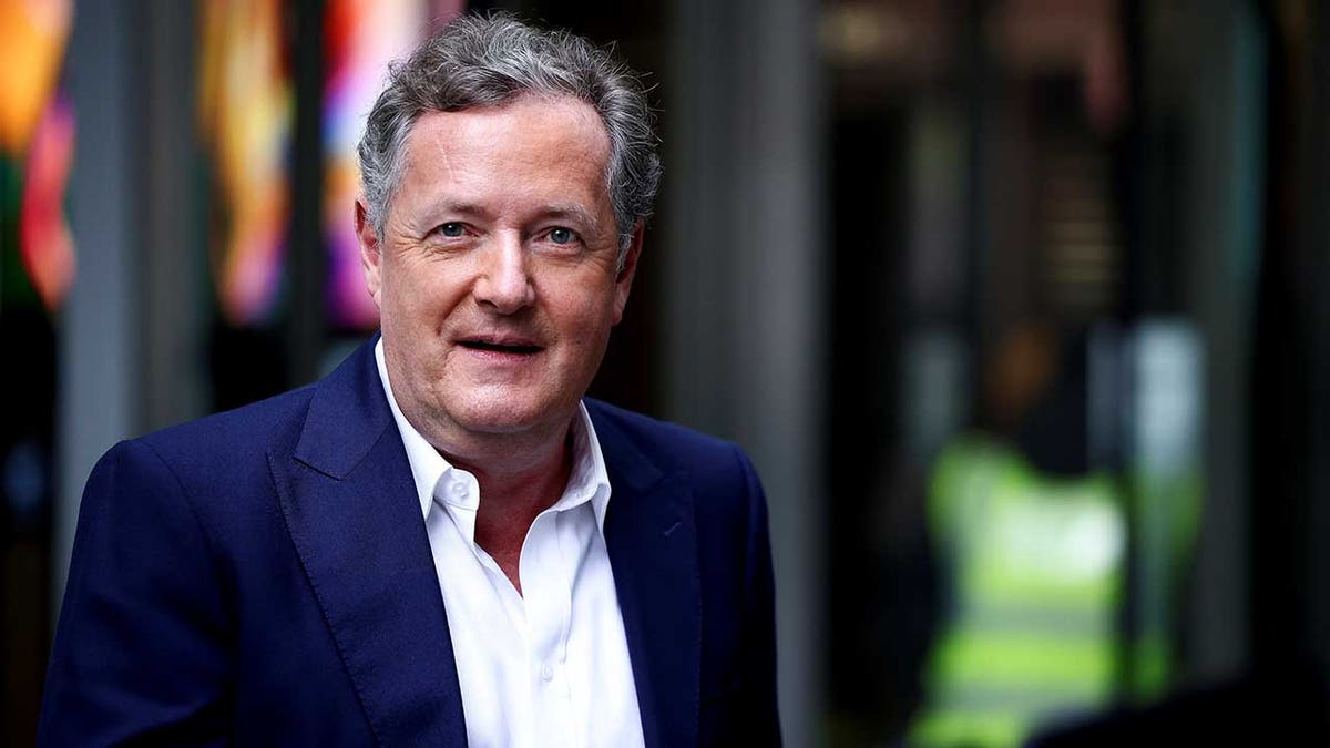 Journalist and TV presenter Piers Morgan walking outside BBC Headquarters in London