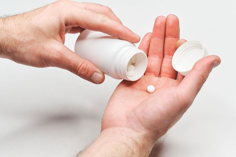 pills in hand