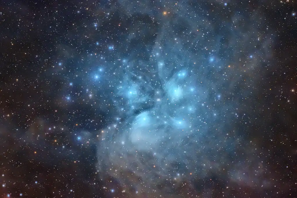 Astronomical nebula with stars and cosmic dust in deep space.