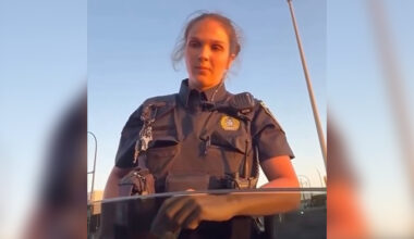 A Montreal police officer appears in a video taken out of a driver's side window