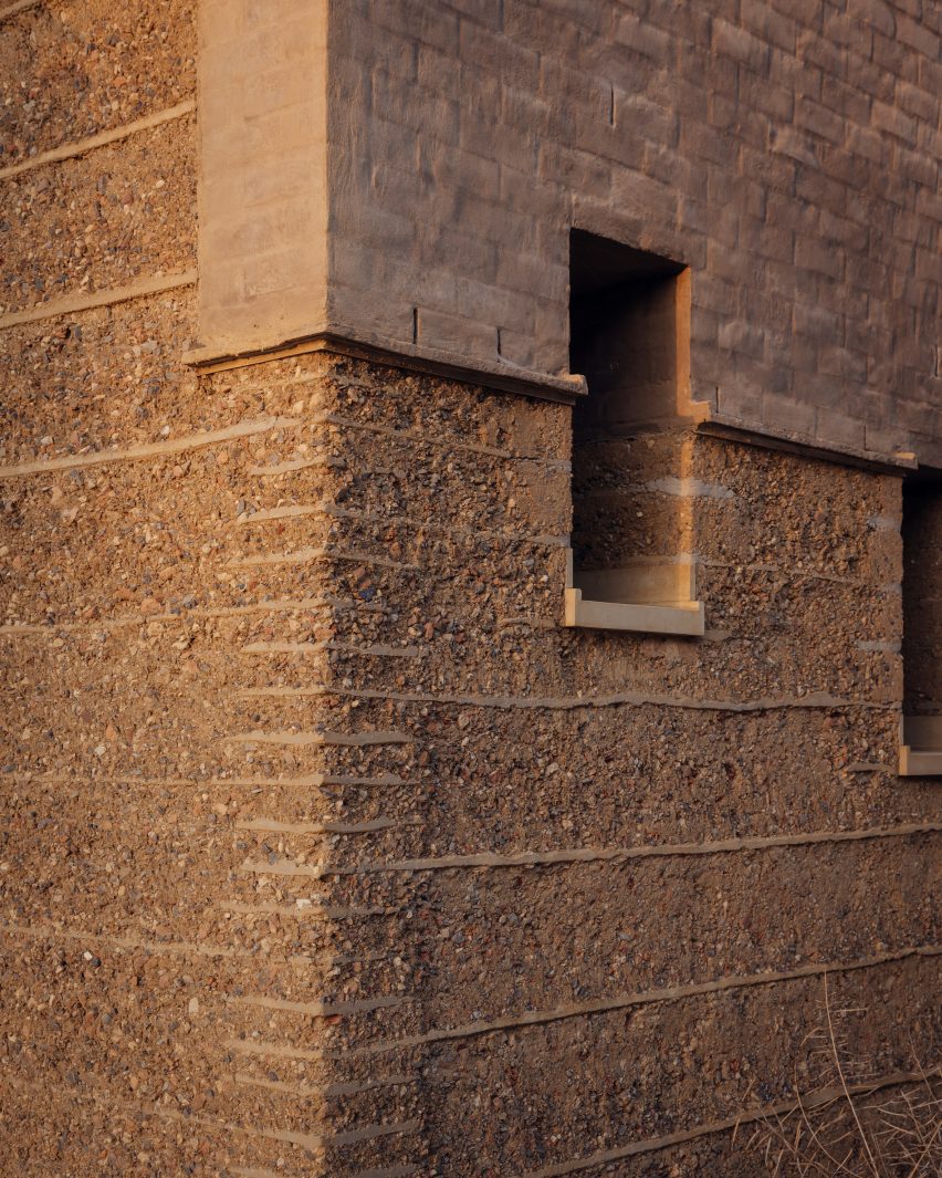 Window of Rammed Earth House by Tuckey Design