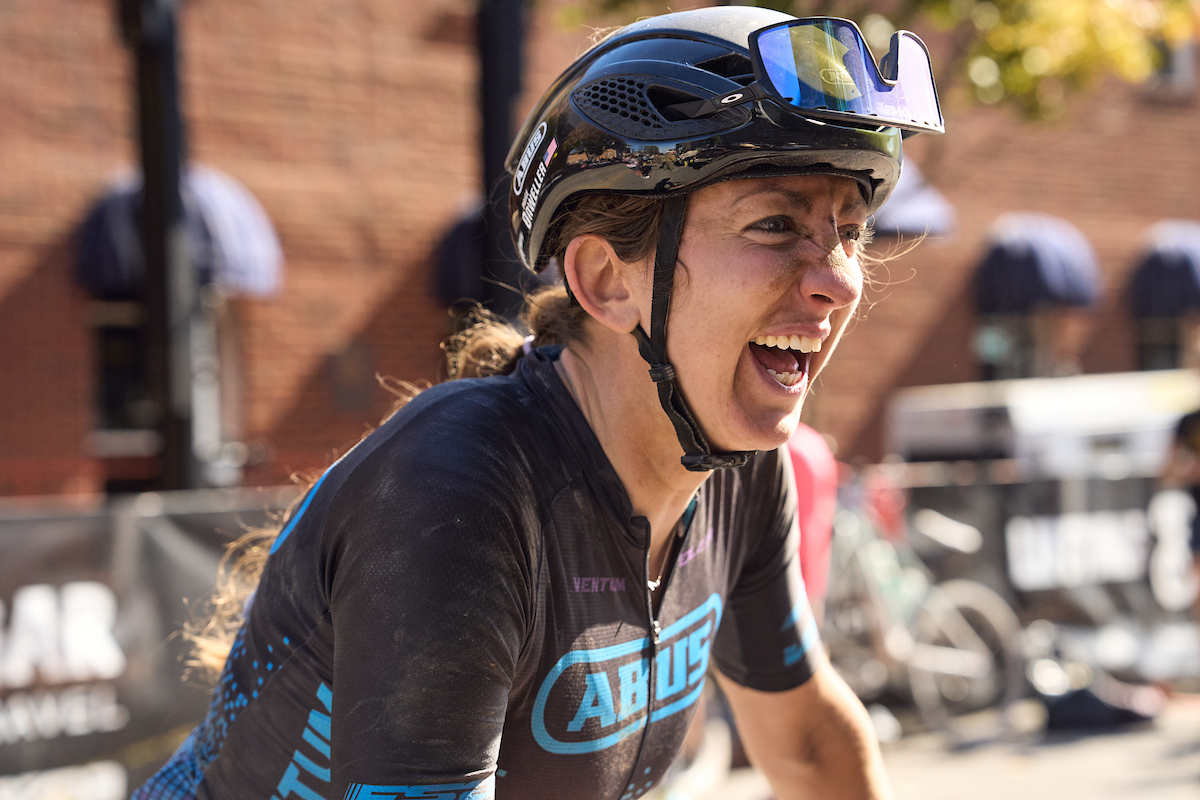 Paige Onweller celebrates her victory after 104 gruelling miles at the 2022 Big Sugar Gravel