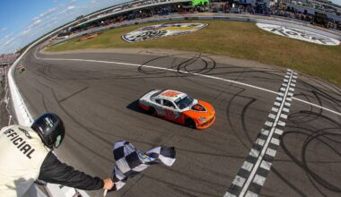 William Sawalich, driver of the #18 Soundgear Toyota, takes the checkered flag to win the NASCAR O'Reilly Auto Parts Series North Carolina Education Lottery 250 Presented by Black's Tire at Rockingham Speedway on April 04, 2026 in Rockingham, North Carolina. (Photo by James Gilbert/Getty Images)