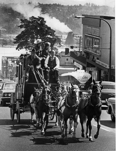 1966: The stage is in. Six small horses pull the B.C. centennial stagecoach up Sixth Street hill in New Westminster. The stage was making the 870-kilometre trip from Barkerville to Victoria. Photographed driving the stage is Bill Garrow and riding with him on the box are Art Perry and two unidentified boys.