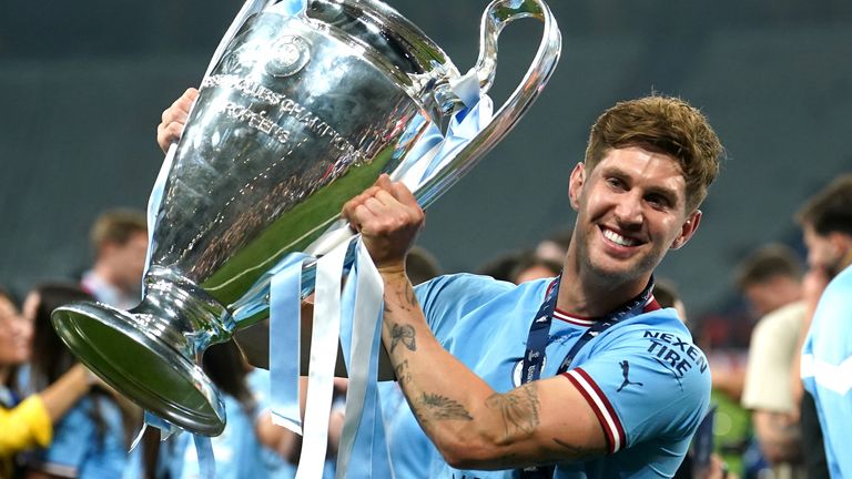 John Stones lifts the Champions League trophy