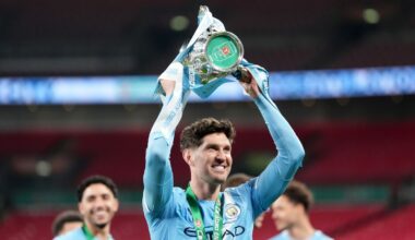 Manchester City's John Stones with the trophy after winning the Carabao Cup Final at Wembley Stadium, London. Picture date: Sunday March 22, 2026. PA Photo. Photo credit should read: Adam Davy/PA Wire...RESTRICTIONS: EDITORIAL USE ONLY No use with unauthorised audio, video, data, fixture lists, club/league logos or "live" services. Online in-match use limited to 120 images, no video emulation. No use in betting, games or single club/league/player publications.