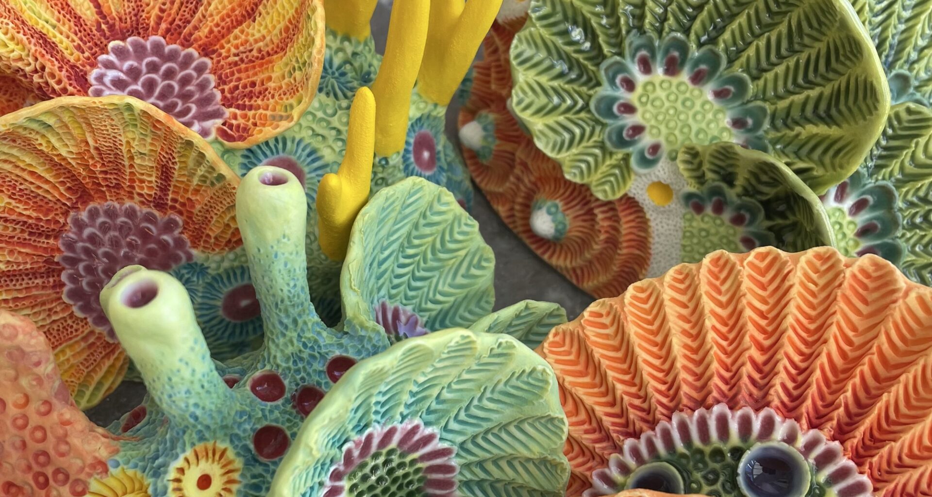 a selection of coral-inspired, colorful ceramic sculptures by Lisa Stevens