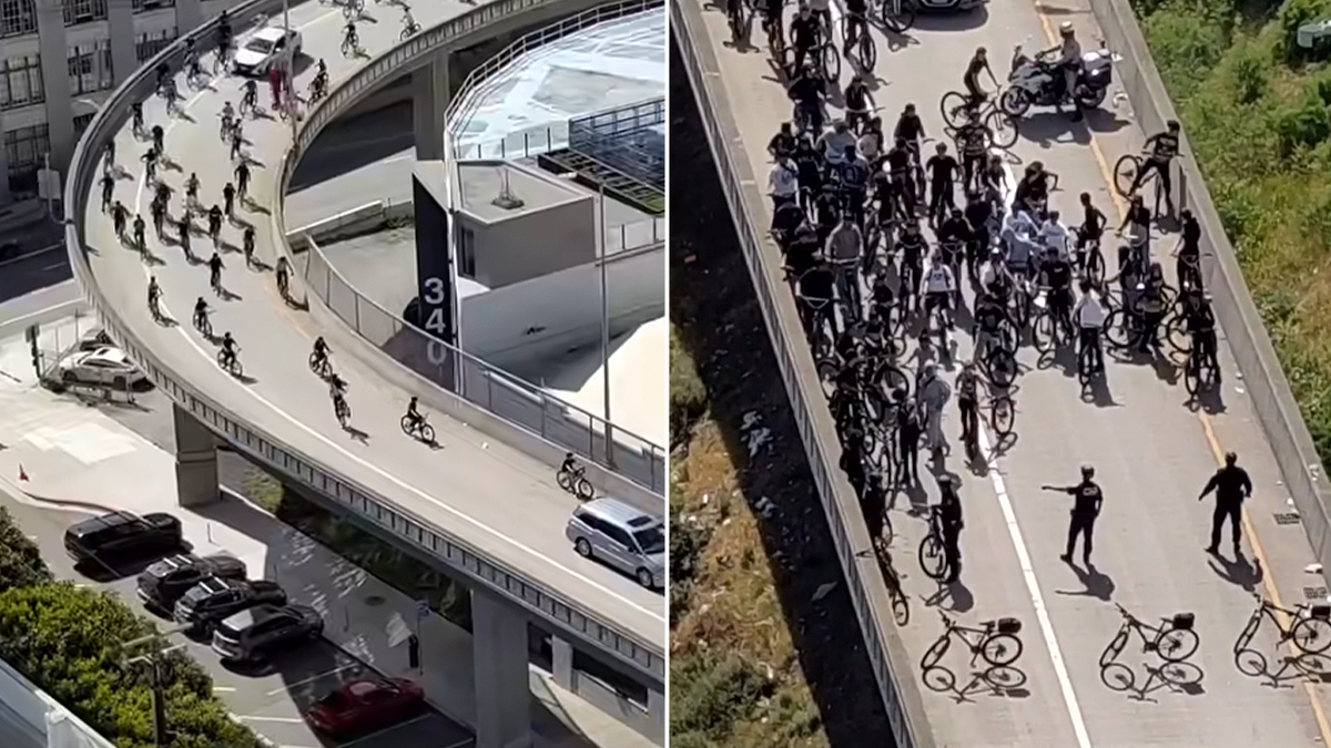 Cyclists ride up curved ramp toward Bay Bridge during takeover attempt