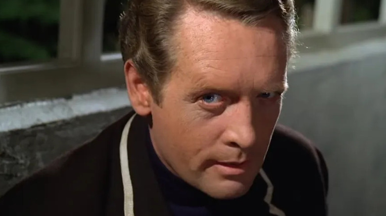 Number Six (Patrick McGoohan) is skeptical in The Prisoner