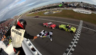 Corey Heim, driver of the #1 Robinhood Toyota, takes the checkered flag ahead of Kaden Honeycutt, driver of the #11 Safelite Toyota, to win the NASCAR Craftsman Truck Series Black's Tire 200 at Rockingham Speedway on April 03, 2026 in Rockingham, North Carolina. (Photo by Meg Oliphant/Getty Images for NASCAR)