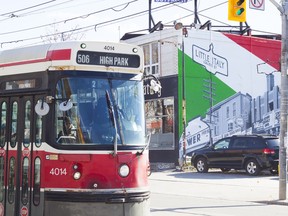 Public transit like Toronto's streetcars, shown here in Little Italy, is one of the best ways to get around town during the World Cup festivities.