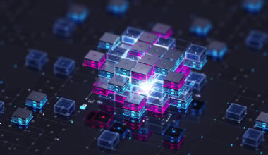 Multi-colored blocks stacked on top of a circuit board.