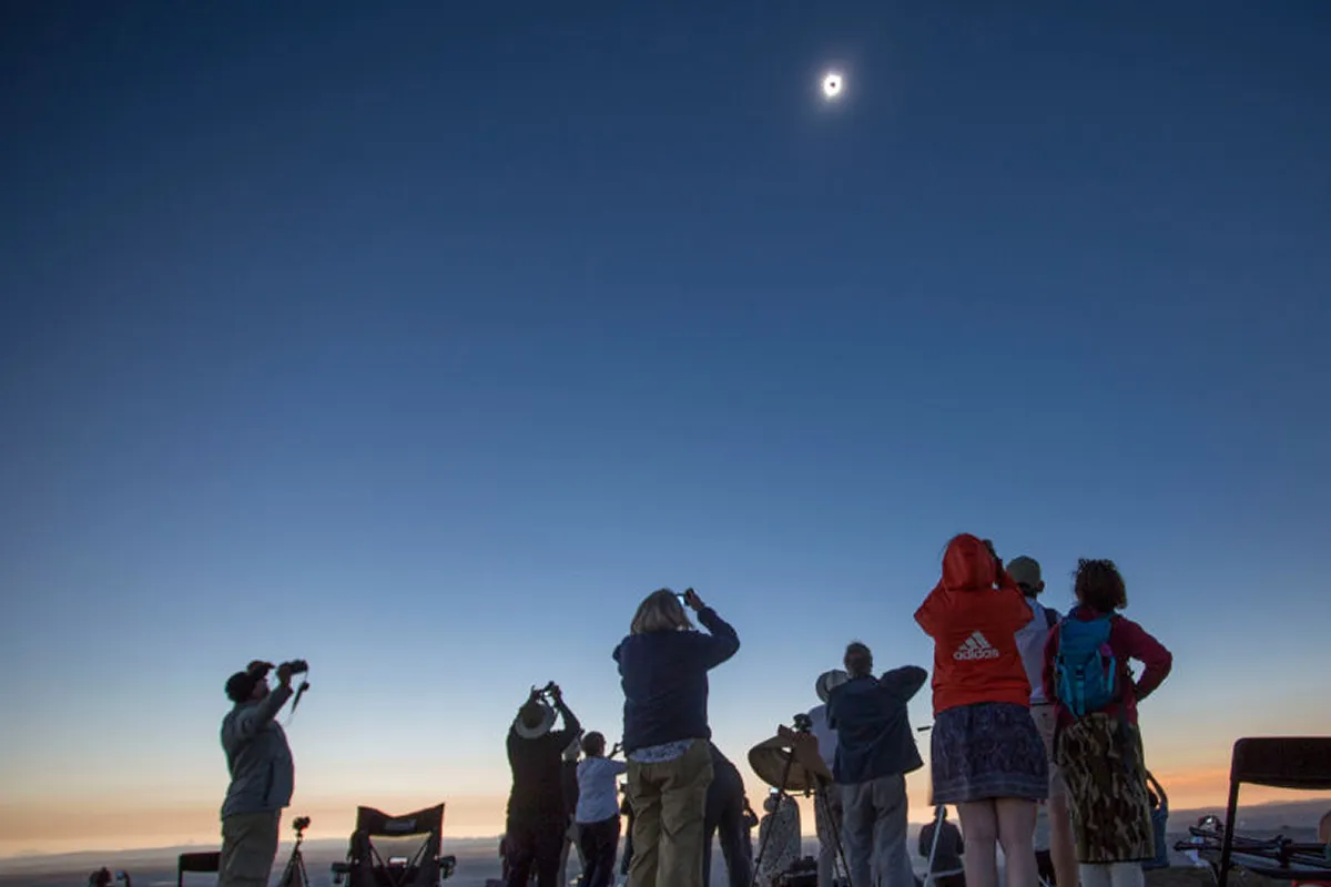Eclipse-chasers observing a solar eclipse on 21 August 2017 in Idaho, USA. Photo by Natalie Behring/Getty Images