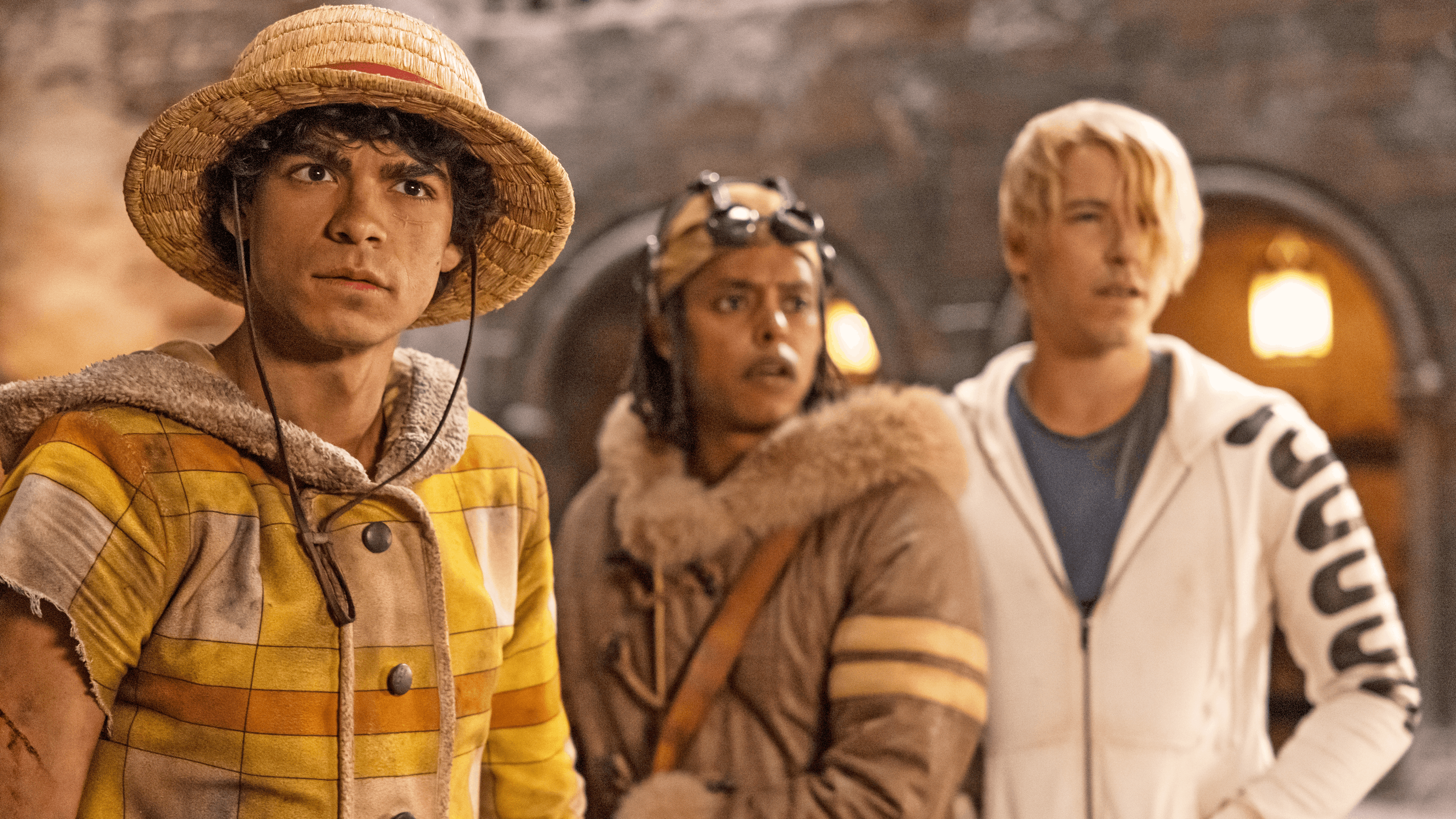 (L to R) Iñaki Godoy as Monkey D. Luffy, Jacob Romero as Usopp, Taz Skylar as Sanji in season 2 of "One Piece."