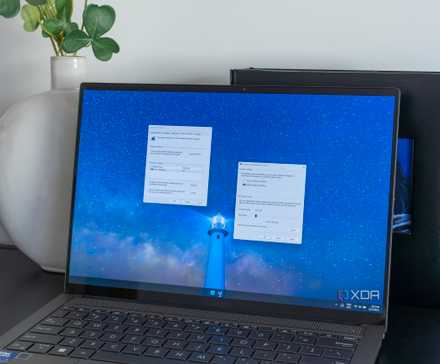 A Windows 11 laptop showing System Restore settings