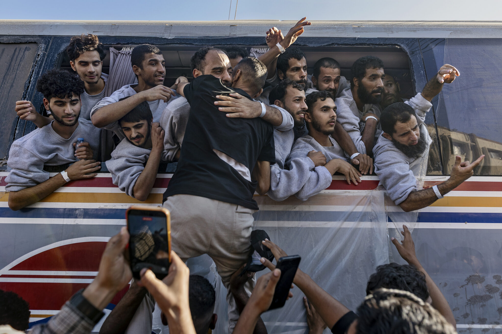 Saher Alghorra, “Witnessing Gaza,” for the New York Times. Palestinian detainees and prisoners arrive at Nasser Hospital after being released from Israeli custody as part of the ceasefire agreement. Israel freed nearly 2,000 Palestinians. Khan Younis, Gaza Strip, October 13, 2025.