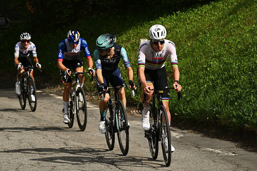 Pogacar pulling away with three riders following