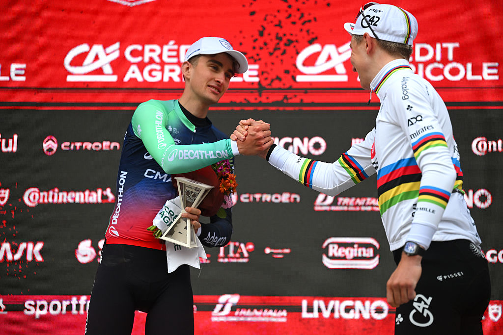 Paul Seixas of France and Team Decathlon CMA CGM on second place and race winner Tadej Pogacar of Slovenia and UAE Team Emirates - XR pose on the podium ceremony after the 20th Strade Bianche 2026.