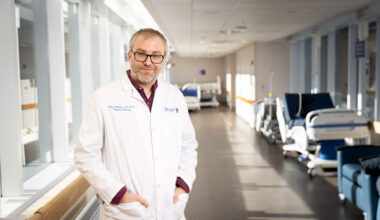 Adam Rodman standing in hospital corridor.