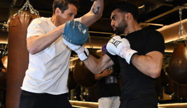 A photograph of super-lightweight boxer Adam Azim, wearing white Everlast gloves, in training at the JAB gym ahead of his 30 May fight with Steve Claggett
