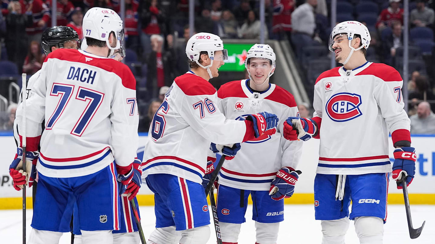 Apr 12, 2026; Elmont, New York, USA; Montreal Canadiens right wing Zachary Bolduc (76) celebrates a third period goal with center Kirby Dach (77), defenseman Lane Hutson (48) and defenseman Arber Xhekaj (72) at UBS Arena. Mandatory Credit: Alexander Wohl-Imagn Images