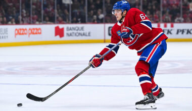 Sep 25, 2025; Montreal, Quebec, CAN; Montreal Canadiens defenseman David Reinbacher (64) shoots the puck Toronto Maple Leafs during the third period at Bell Centre. Mandatory Credit: David Kirouac-Imagn Images