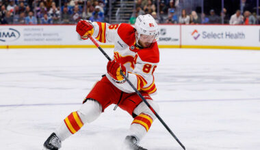 Apr 9, 2026; Denver, Colorado, USA; Calgary Flames left wing Joel Farabee (86) controls the puck in the third period against the Colorado Avalanche at Ball Arena. Mandatory Credit: Isaiah J. Downing-Imagn Images