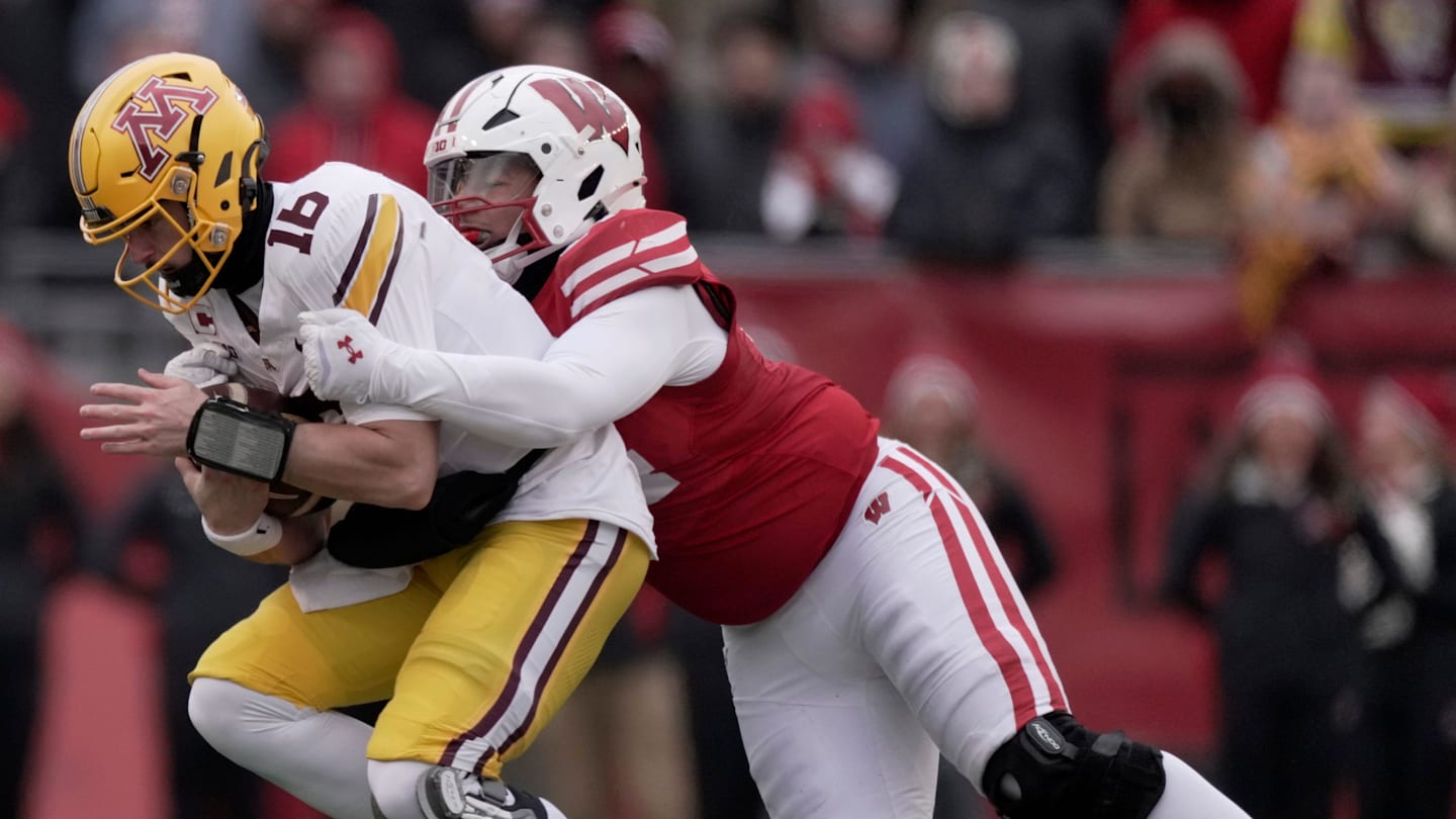 Wisconsin defensive lineman Elijah Hills (94) sacks Minnesota quarterback Max Brosmer (16) during the second quarter of their game at Camp Randall Stadium Friday, November 29, 2024 in Madison, Wisconsin.Mark Hoffman/Milwaukee Journal Sentinel